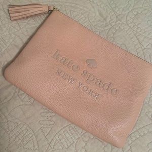 Kate Spade sienne logo large tassel pouch